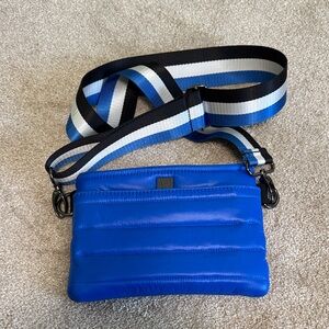 Think Royln Bum Bag 2.0. 

Crossbody, shoulder bag, waist bag, or fanny pack.